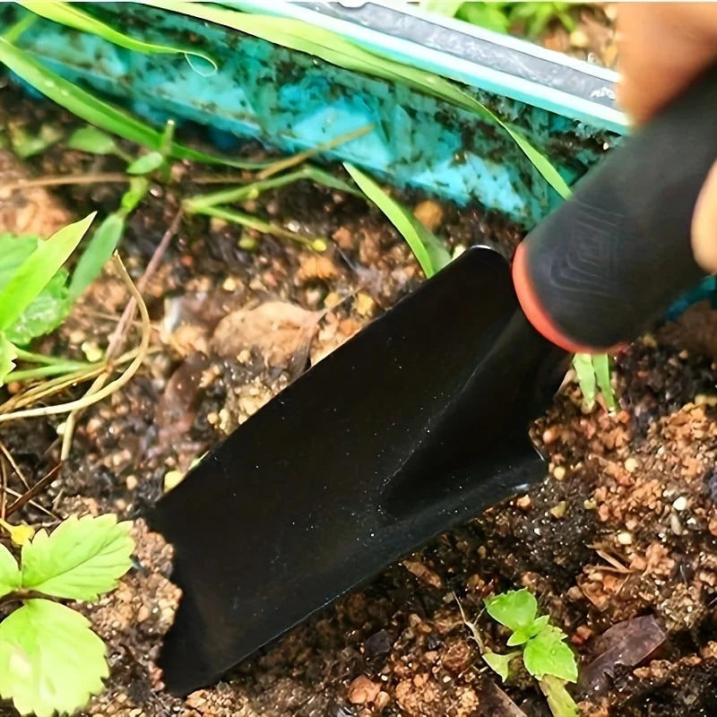 A Set of Four Outdoor Gardening Tools Including a Small Shovel for Planting Flowers, a Five-Pronged Rake, a Double-Headed Rake