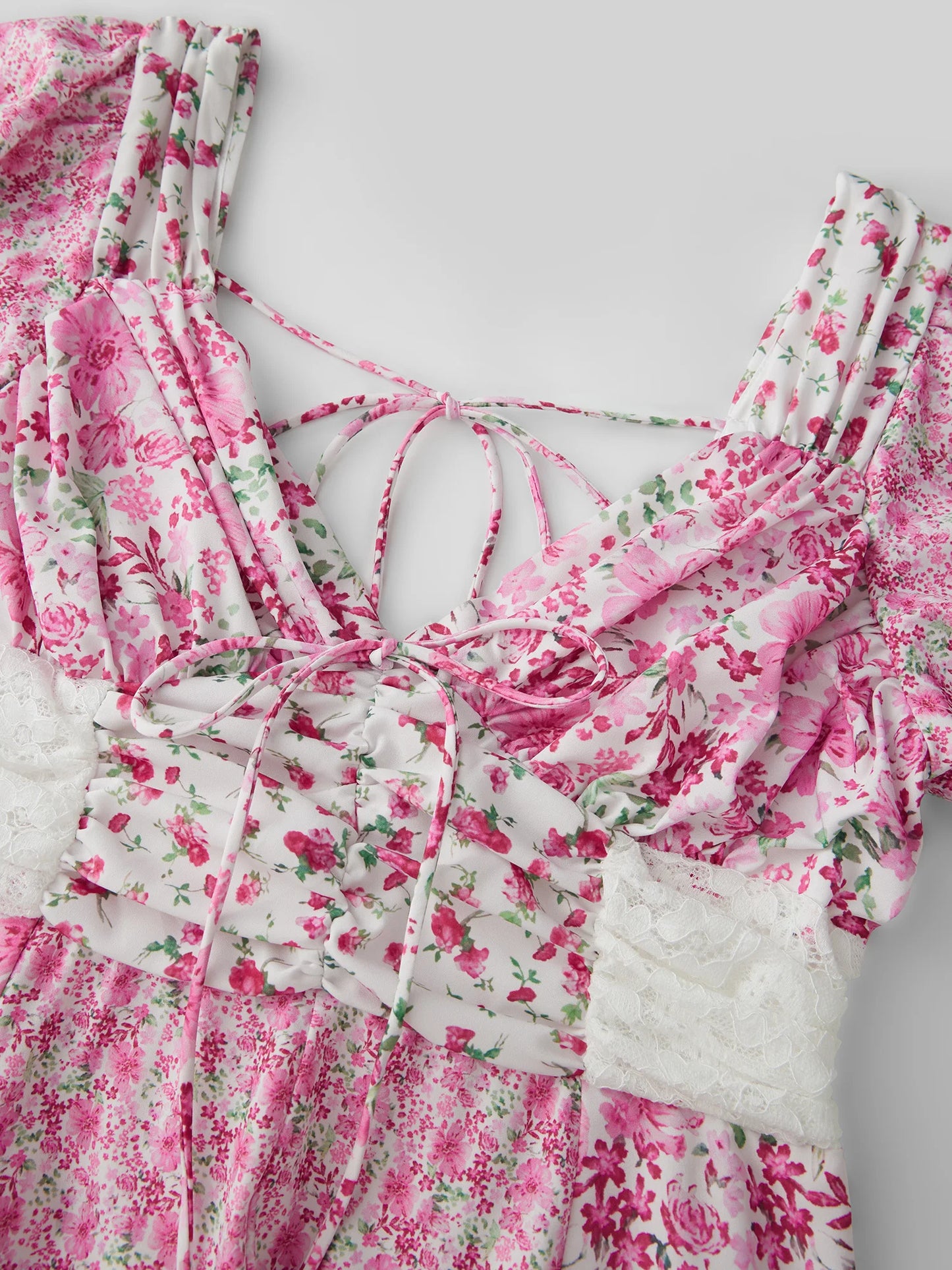 Elegant Floral Print Mini Dress with Chic Tie Bow Detail Delicate Lace Trim Flattering V Neckline and Short Sleeves Perfect