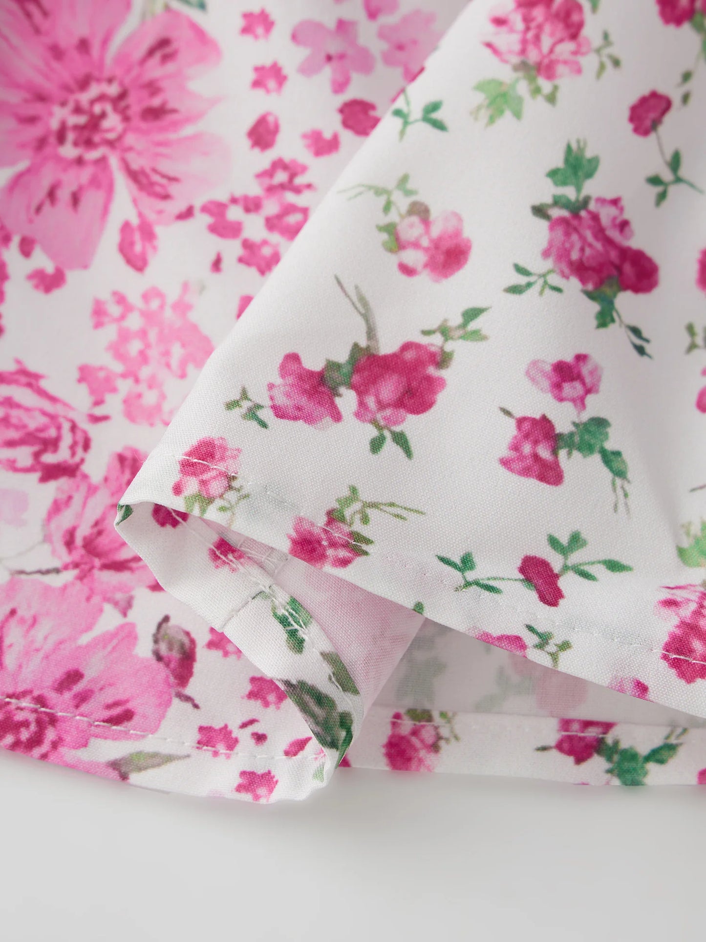 Elegant Floral Print Mini Dress with Chic Tie Bow Detail Delicate Lace Trim Flattering V Neckline and Short Sleeves Perfect